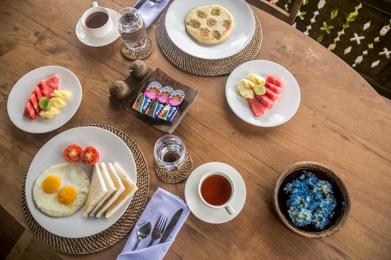 Benisari Batik Garden Cottage อูบุด ภายนอก รูปภาพ